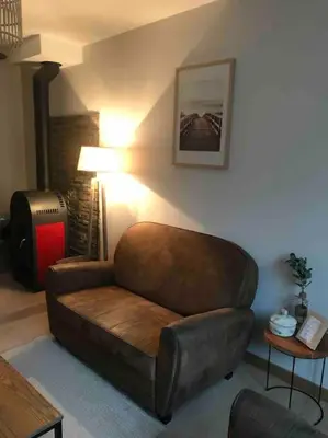 Coin salon dans l'établissement Le Baluchon Portais - Gîte de Charme