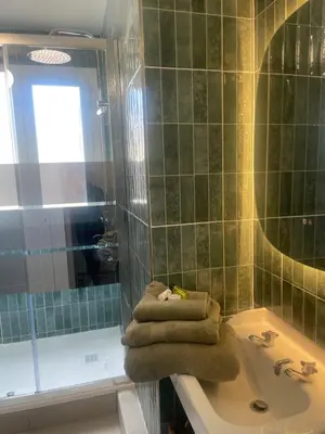 Salle de bains dans l'établissement Le vaugueux