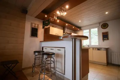 Cuisine ou kitchenette dans l'établissement les pieds dans l'eau