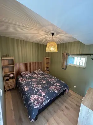 Un ou plusieurs lits dans un hébergement de l'établissement Maison à la campagne