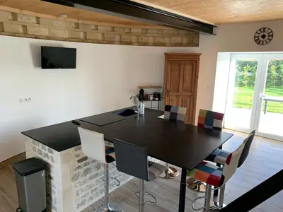 Télévision ou salle de divertissement dans l'établissement Gite MANULAU
