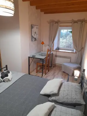 Un ou plusieurs lits dans un hébergement de l'établissement Domaine de la Tour carrée - 3 Chambres