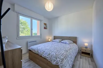 Un ou plusieurs lits dans un hébergement de l'établissement Le Côtier - Appt à 200m de la plage