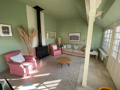 Coin salon dans l'établissement Le Petit Shamrock - villa sur la plage