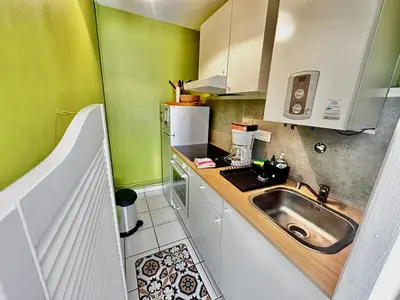 Cuisine ou kitchenette dans l'établissement La Casita, triplex avec jardin proche du centre