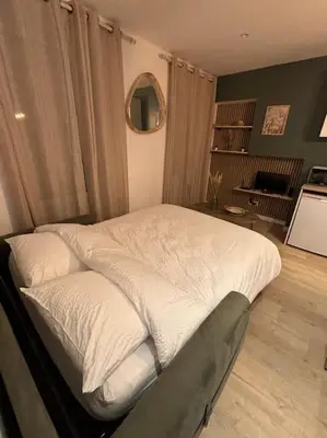 Cuisine ou kitchenette dans l'établissement Studio Bois flotté Cherbourg Netflix Parking