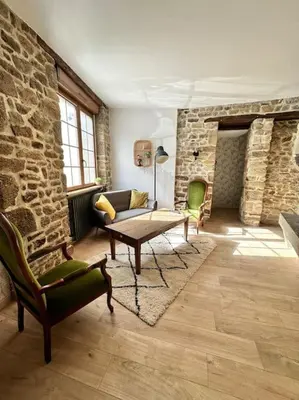 Coin salon dans l'établissement Petite maison de ville