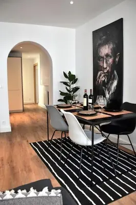 Coin salon dans l'établissement Hyper Centre - Élégant Appartement au Pied des Restaurants et Boutiques