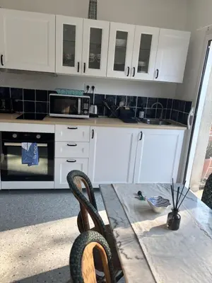 Cuisine ou kitchenette dans l'établissement Gîte du Cap Romain