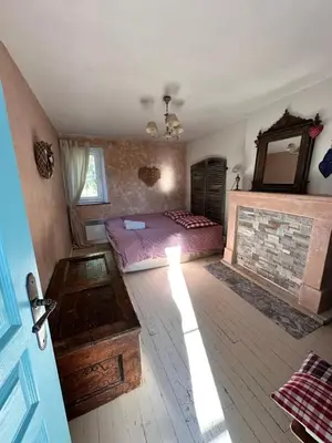Un ou plusieurs lits dans un hébergement de l'établissement Normandie ferme restaurée du 18ème avec jacuzzi