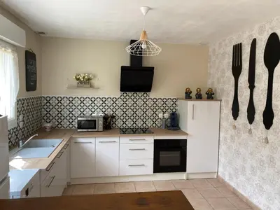 Cuisine ou kitchenette dans l'établissement Le gîte du bonheur