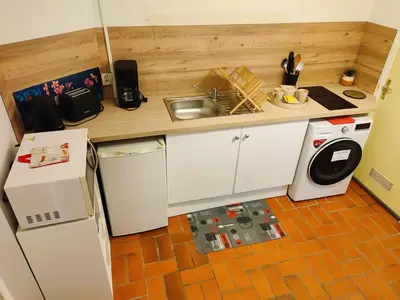Cuisine ou kitchenette dans l'établissement Gîte Bienvenue chez Naty