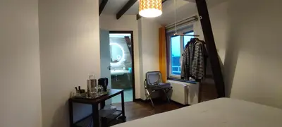 Un ou plusieurs lits dans un hébergement de l'établissement Le Petit Moulin Rouge, B&B, SDB en-suite, parking privé gratuit