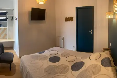 Un ou plusieurs lits dans un hébergement de l'établissement Superbe appartement proche mont saint michel