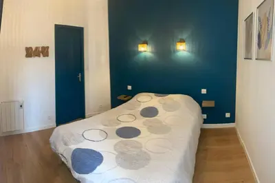 Un ou plusieurs lits dans un hébergement de l'établissement Superbe appartement proche mont saint michel