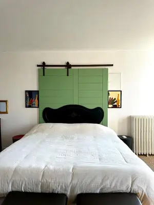 Un ou plusieurs lits dans un hébergement de l'établissement Chambre d'hôtes de charme Partager Enregistrer