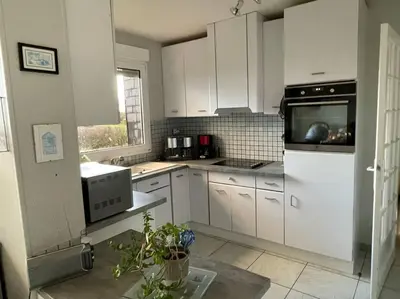 Cuisine ou kitchenette dans l'établissement Maison vue sur mer