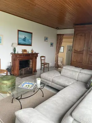 Coin salon dans l'établissement Maison vue sur mer