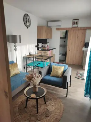 Cuisine ou kitchenette dans l'établissement Logement proche Caen et plages