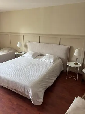 Un ou plusieurs lits dans un hébergement de l'établissement Chambre Victory
