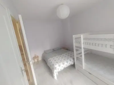 Un ou plusieurs lits dans un hébergement de l'établissement Villa de l'epi Grandcamp Maisy