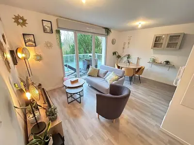 Coin salon dans l'établissement Appartement récent tout confort