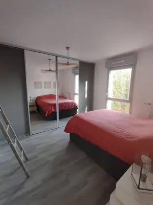 Un ou plusieurs lits dans un hébergement de l'établissement Appartement récent tout confort