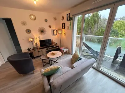 Coin salon dans l'établissement Appartement récent tout confort