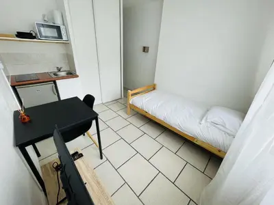 Un ou plusieurs lits dans un hébergement de l'établissement Banyo, Studio 1p proche centre ville