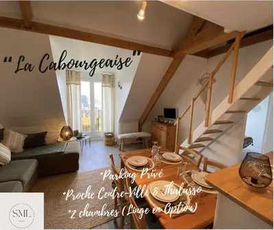 Coin salon dans l'établissement La Cabourgeaise-Proche Thalasso et Centre de Cabourg