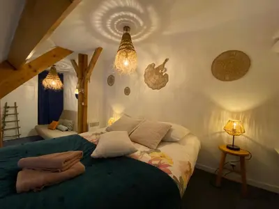 Un ou plusieurs lits dans un hébergement de l'établissement La Cabourgeaise-Proche Thalasso et Centre de Cabourg