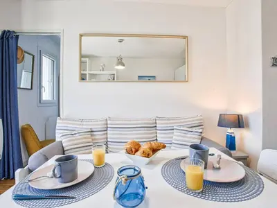 Coin salon dans l'établissement Appartement à Cabourg avec balcon et parking, proche mer - FR-1-788-41