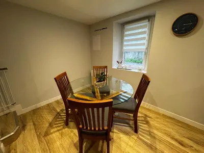 Coin salon dans l'établissement Petite maison Normande Calme Meublé Tourisme 2 étoiles