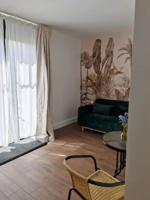 Coin salon dans l'établissement Domaine de l'îsle Manière 10 pers