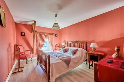 Un ou plusieurs lits dans un hébergement de l'établissement La Ferme de la Chapelle Saint-Roch - Maison de 190 m2