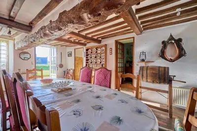 Coin salon dans l'établissement La Ferme de la Chapelle Saint-Roch - Maison de 190 m2