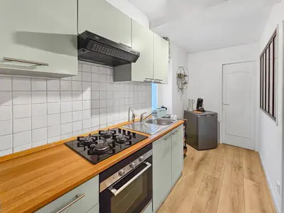 Cuisine ou kitchenette dans l'établissement Le SweetHome
