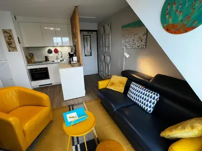 Cuisine ou kitchenette dans l'établissement Les Mimosas -Joli appartement tout confort