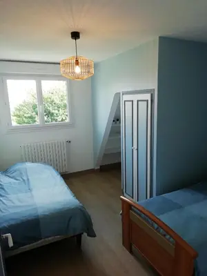 Un ou plusieurs lits dans un hébergement de l'établissement Maison familiale pour un agréable séjour