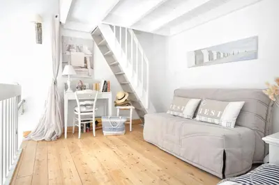 Coin salon dans l'établissement Les balcons des Ecréhous - Duplex front de mer