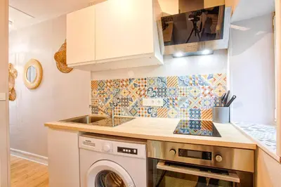 Cuisine ou kitchenette dans l'établissement Le Tropical