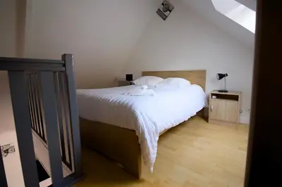 Un ou plusieurs lits dans un hébergement de l'établissement Triplex Lumineux à Cherbourg, hyper centre, 2 pas du Port & Vie Nocturne, Intendance Luxury Host