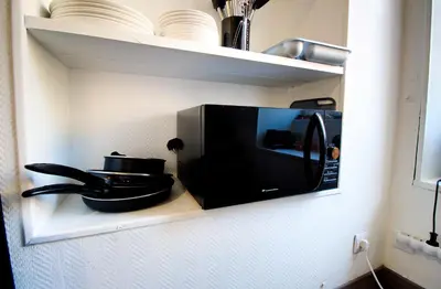 Cuisine ou kitchenette dans l'établissement Petit Duplex Lumineux, hyper centre à 2 pas du port, Intendance Luxury Host