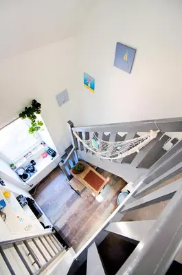Coin salon dans l'établissement Petit Duplex Lumineux, hyper centre à 2 pas du port, Intendance Luxury Host