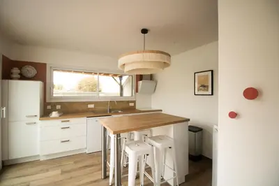 Cuisine ou kitchenette dans l'établissement Petite maison cosy