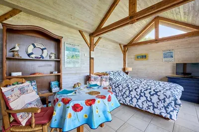 Un ou plusieurs lits dans un hébergement de l'établissement The Tiny House - maisonette proche de la plage