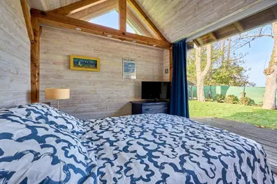 Un ou plusieurs lits dans un hébergement de l'établissement The Tiny House - maisonette proche de la plage