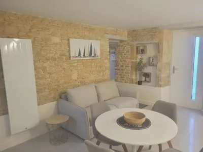 Coin salon dans l'établissement Pti logement chaleureux