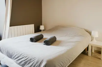 Un ou plusieurs lits dans un hébergement de l'établissement Maison des H, au bord de l'Etang