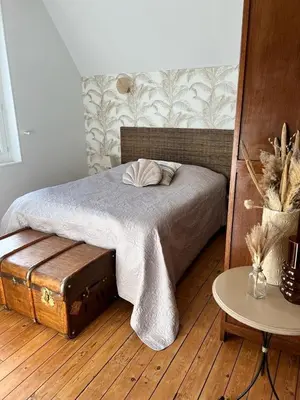 Un ou plusieurs lits dans un hébergement de l'établissement Maison Cosy Bord de Mer